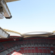 Cameras are pictured on March 28, 2022 above Qatar’s Al-Bayt Stadium in Doha, which will host matches of the FIFA football World Cup 2022